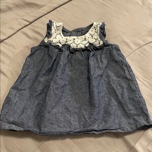 Denim one piece dress with floral trim